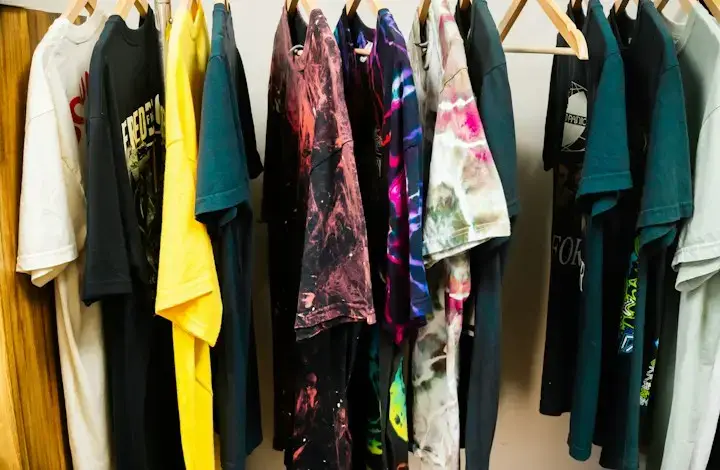 Printed T-shirts on a rack made with artwork converted from image to vector