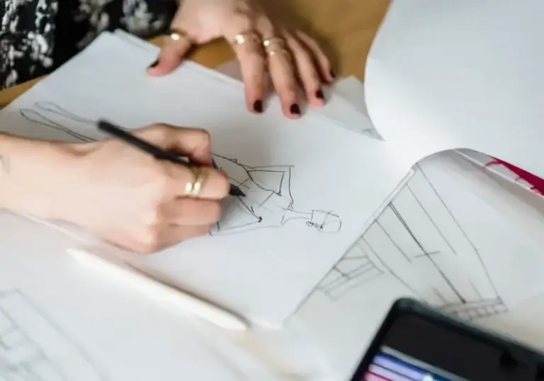 Designer sketching a logo before logo vectorization