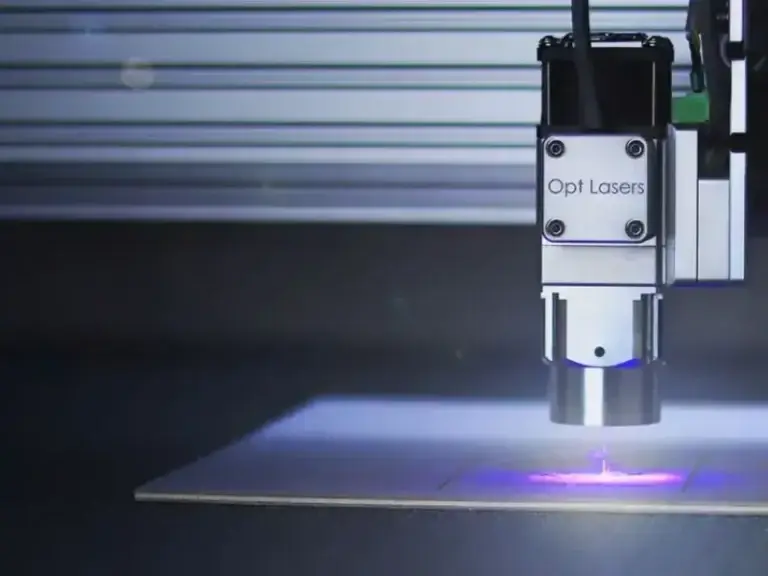 Laser cutter using vector paths made by raster to vector conversion